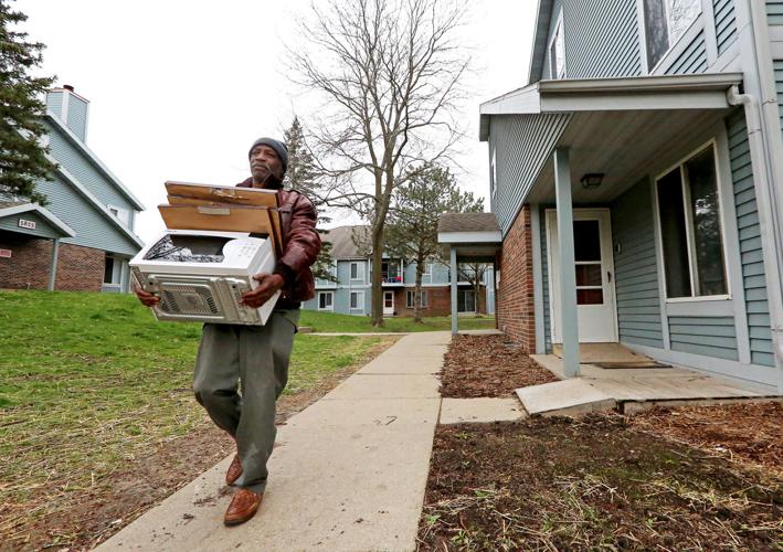 Nelson Turner moves out his belonging