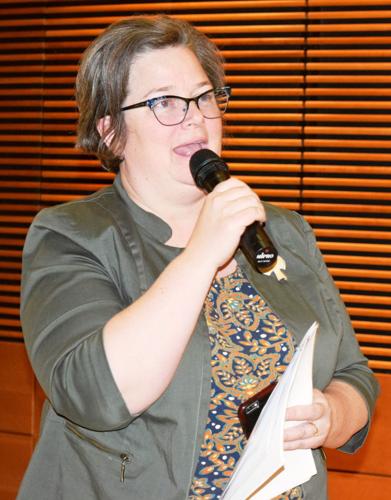 Sarah Lloyd speaking at reception prior to American Antitrust Institute program