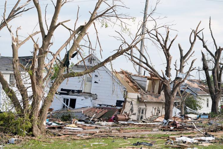 Homes suffer extreme damage following severe weather, including a tornado Monday, July 27, 2026, in Menasha, Wisconsin. Dan