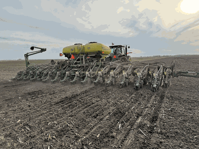 planter in a field in Macon County, Ill.