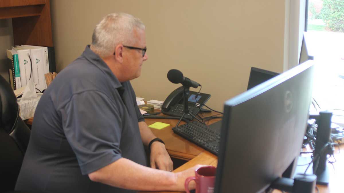 Bill Northey at desk