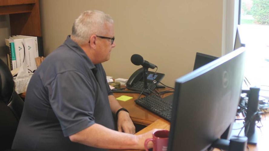 Bill Northey at desk