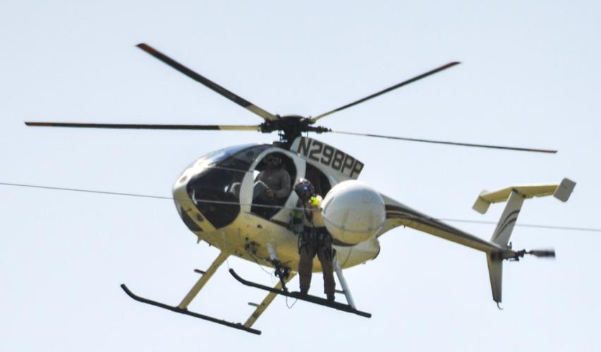 Worker on helicopter