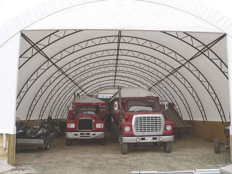 Steel and wood hoop barn structures