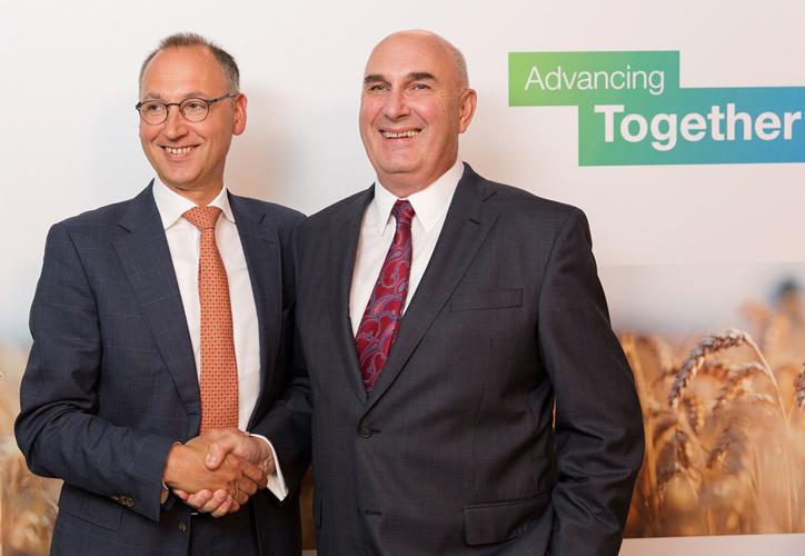 Werner Baumann and Hugh Grant