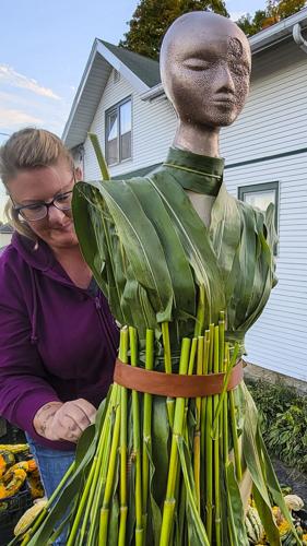 Sally Rech working on mannequin for float