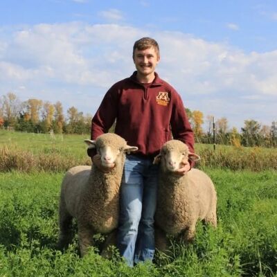 George Lemke with sheep