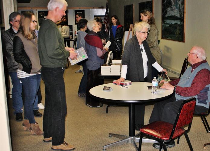Jerry Apps signs books