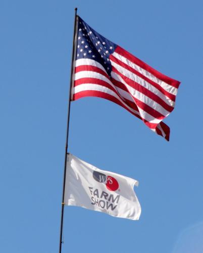 Flags fly above WPS show grounds
