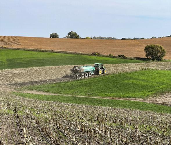 Manure spreader in field