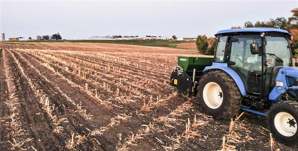 No-till drill and tractor in field post corn-silage harvest