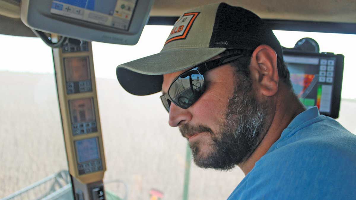Josh Krabbe harvests soybeans