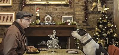 Old man with dog at Christmas
