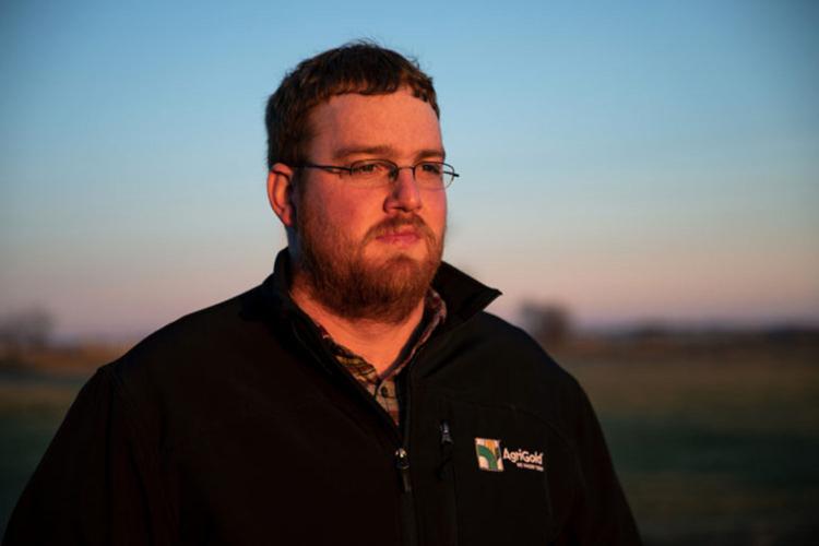 Andrew Bishop looks over farmland