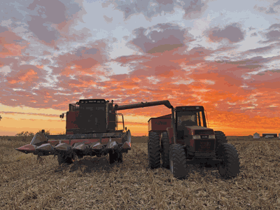 combine grain wagon field harvest sunset