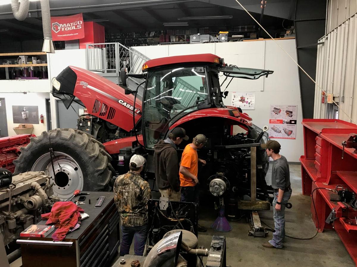 Tractor repair 'more than turning a wrench