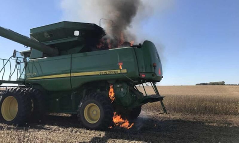 john deere combine on fire