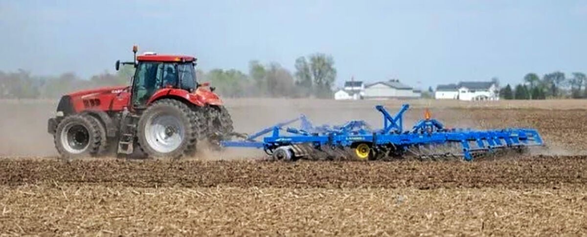 A farmer works in a field Thursday, April 23, 2026, near Janesville, Wis.