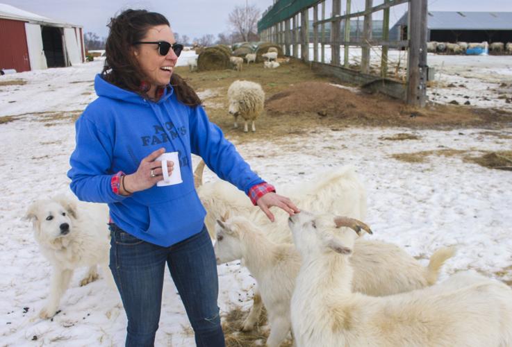 Rachel Bouressa with goats