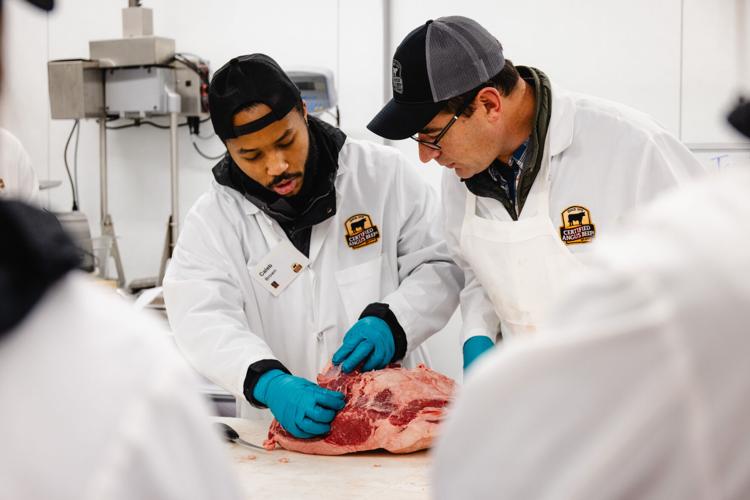 Students with meat scientist