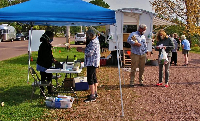 Customers at food wagon