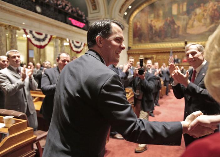 Gov. Scott Walker shakes hands