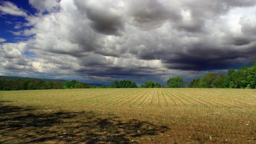 Farm land with clouds