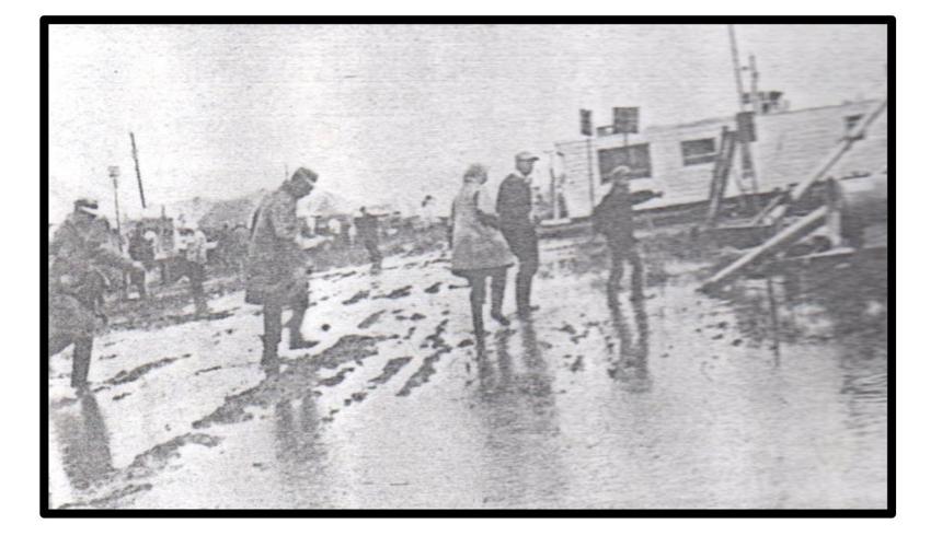 Everything is wet during the 1968 Wisconsin Farm Progress Days in Chippewa County.