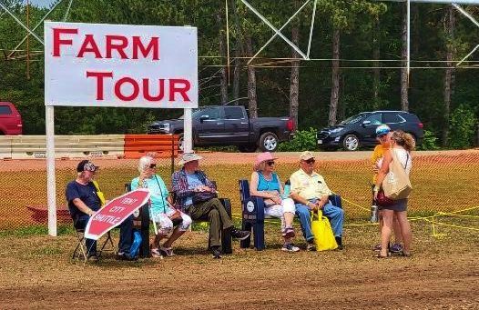 Farm-tour group waits