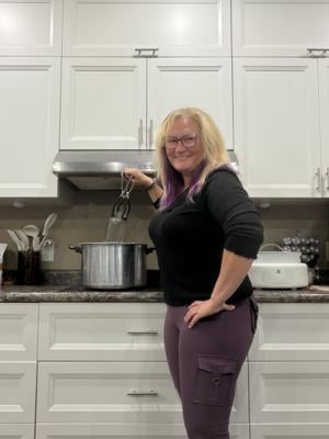 Rachel canning, cooking, storing garden produce