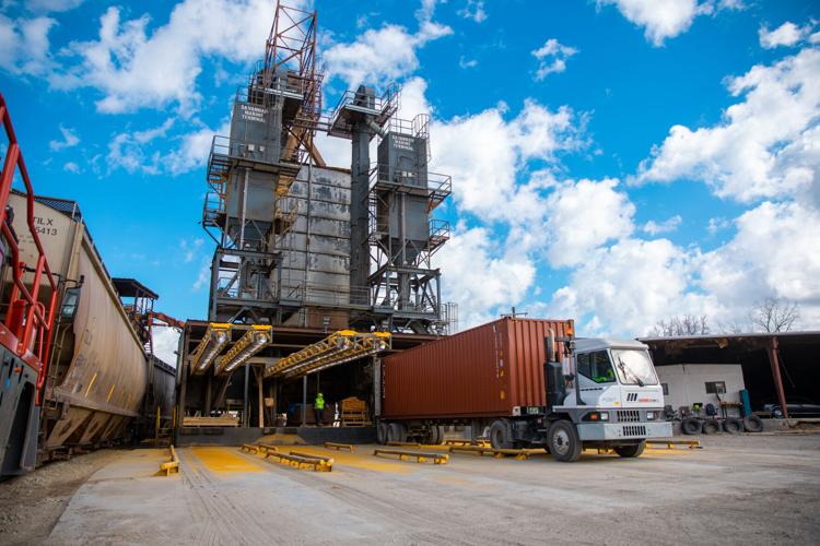 DDGS are unloaded from truck and rail.jpg