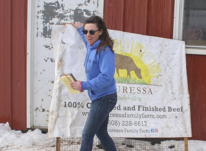 Rachel Bouressa with sign