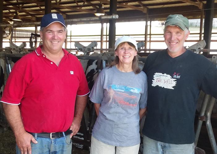 Mark Keller, left, and Sandy and Tim Keller