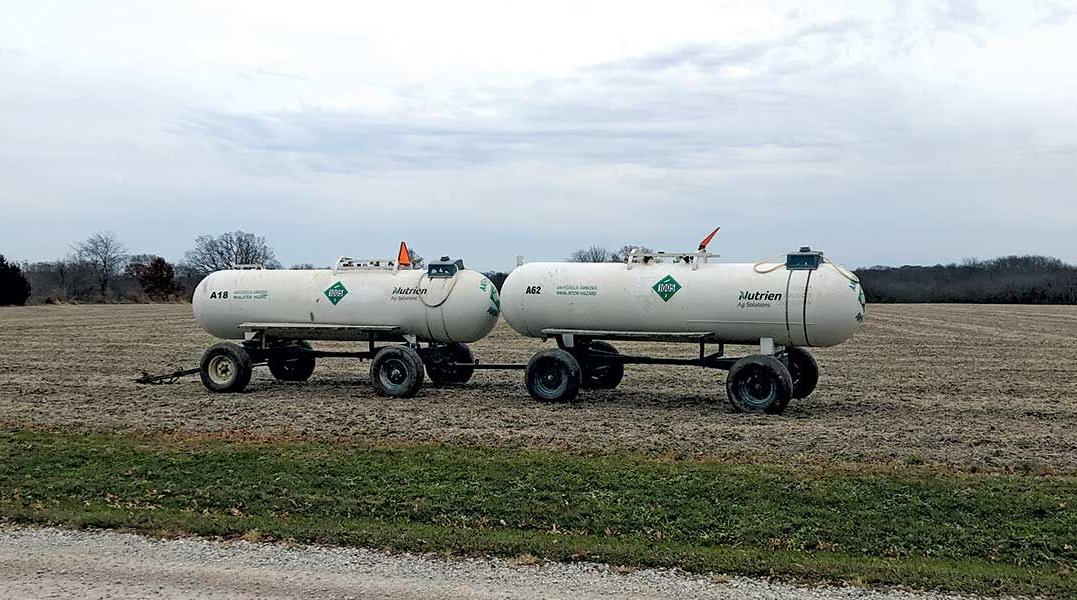 anhydrous fertilizer tanks in field