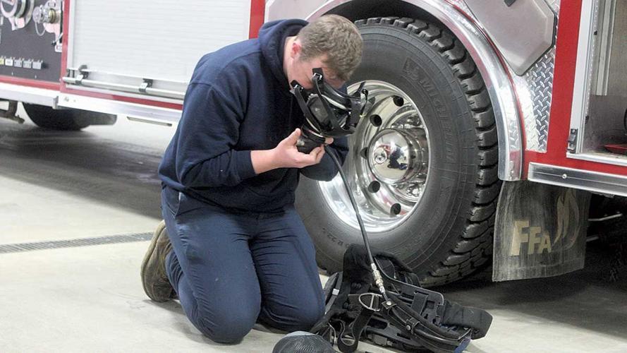 Braxton Major tests a self-contained breathing apparatus
