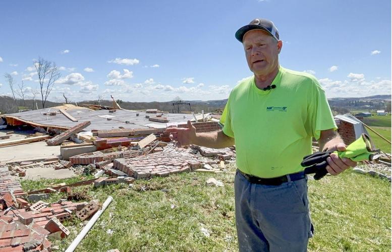 Ray Hohe shows his tornado-ravaged home