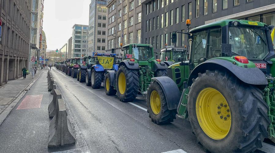 Tractors line street