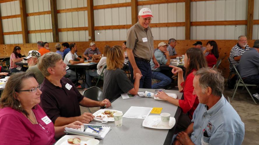 Thomas visits with producers