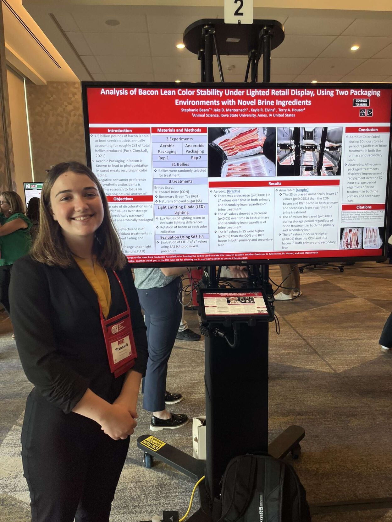 Stephanie Major with poster
