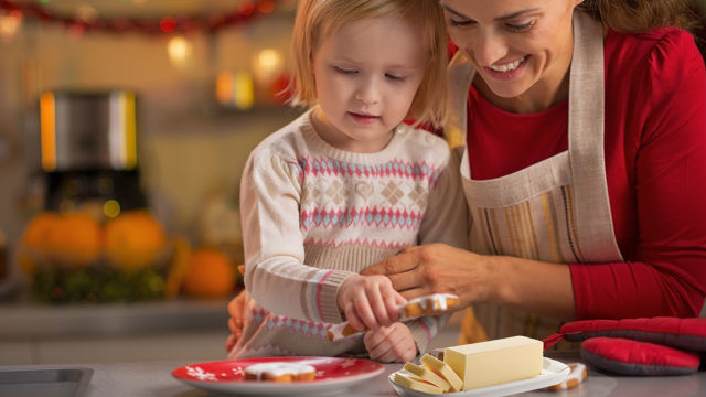Family cutting butter
