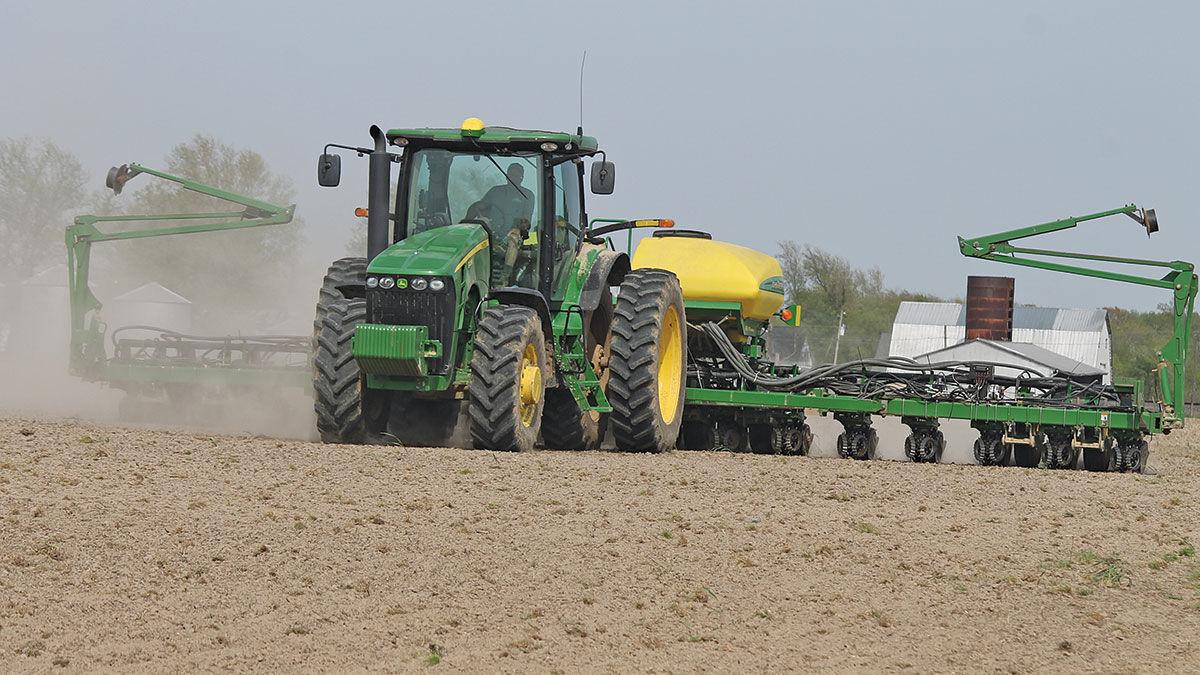Dave Ibendahl crosses a field with his planter