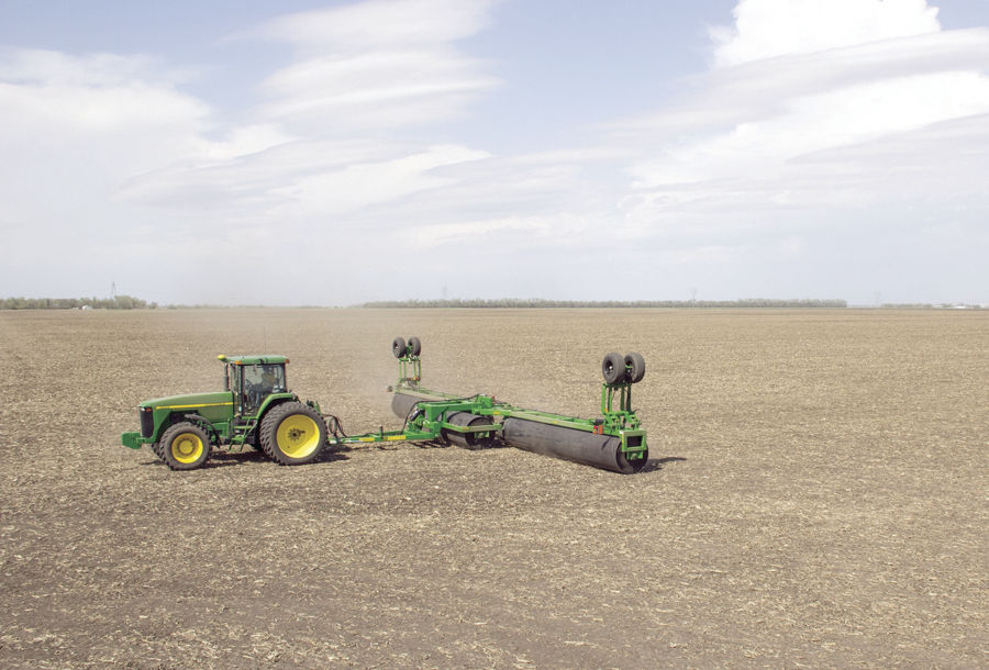 Postemerge rolling of soybeans resulting in increased pod count for