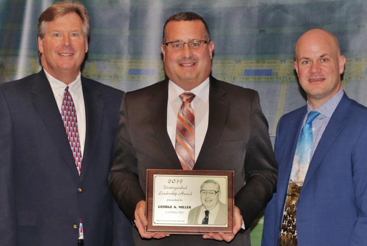 Ziegler accepting award on behalf of Miller