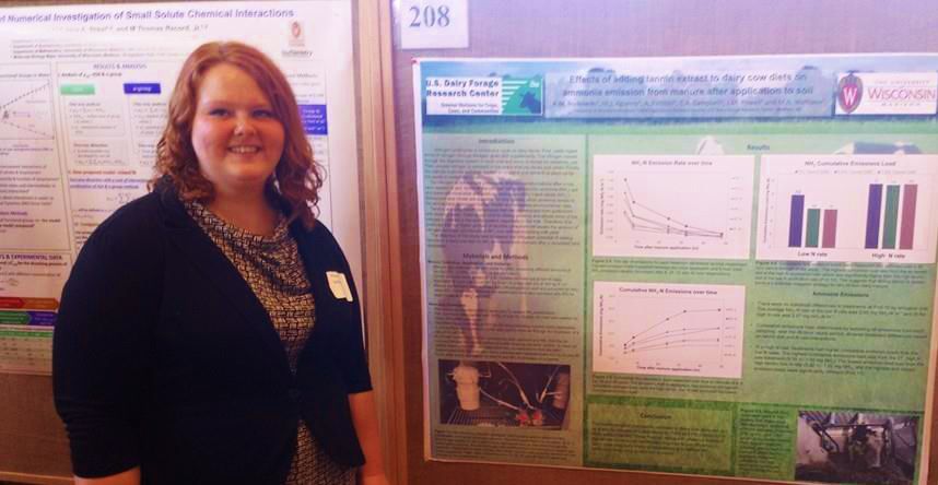 Amanda Borkowski with animal science poster