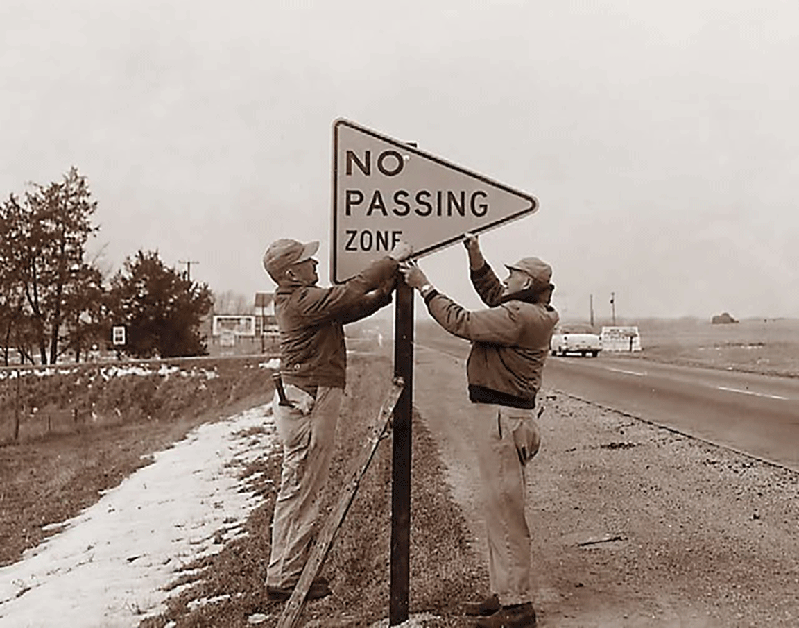 no passing zone sign