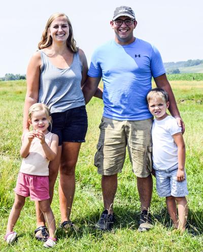Emma and Austin Clary and Claire, 3, and Barron, 5