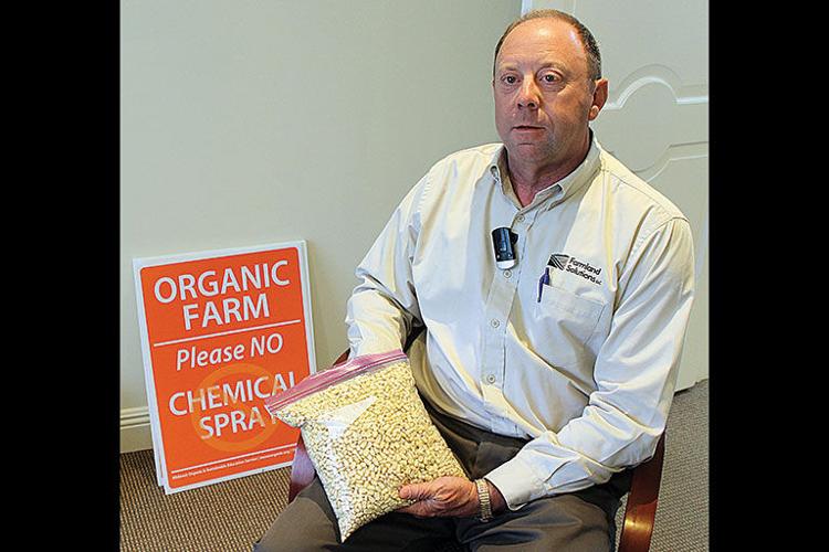 Woodrow holds white corn