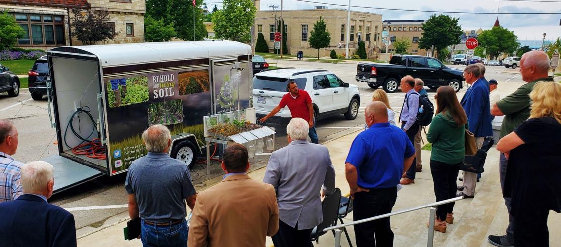 Mike Patin with soil-health trailer