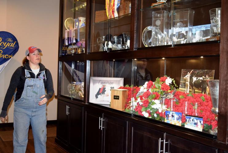 Kelli Cull with trophy showcase