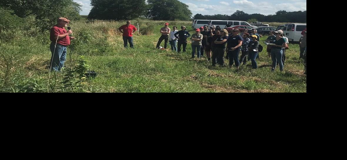 Isenhart speaking to group